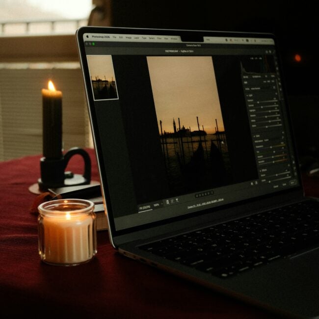 Laptop monitor showing trend-resistant, natural color grading on a high-resolution digital portrait gallery.